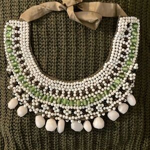 Green and white beaded necklace